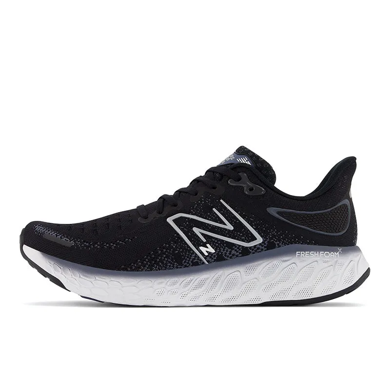 Fresh Foam X 1080v12 - Black with Thunder and White - Men's running in a wooden bridge area shoes
