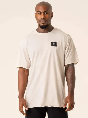 Dynamic Oversized T-Shirt - Stone proper length Quick Release Hem