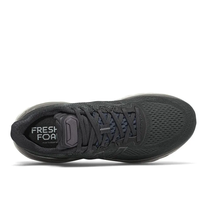Fresh Foam More v3 - Black with Magnet Microporous Membrane running in a marina area shoes